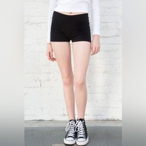 Black tight shorts/spandex. One size and fits perfectly!!